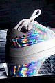 Fancy rainbow sneaker on a checkered disco mirror