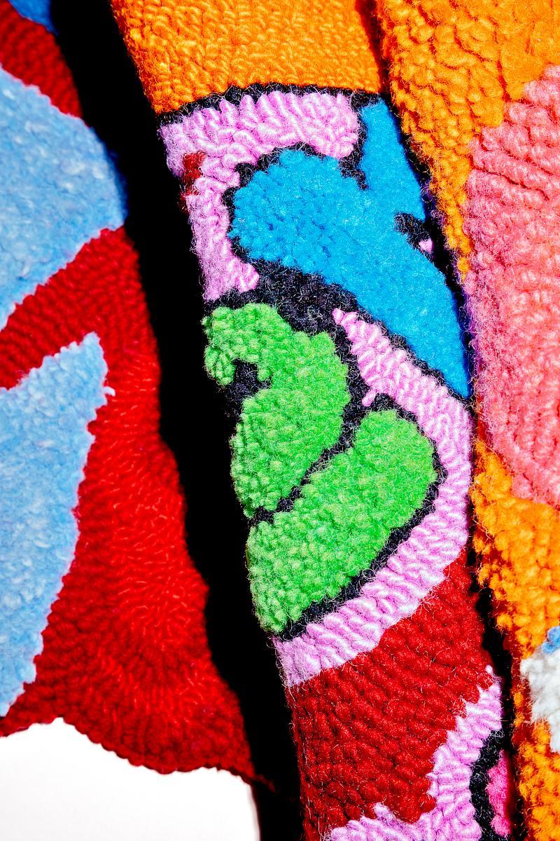 Close-up of the art piece Soft Sculpture CUNT power by Talaya Schmid